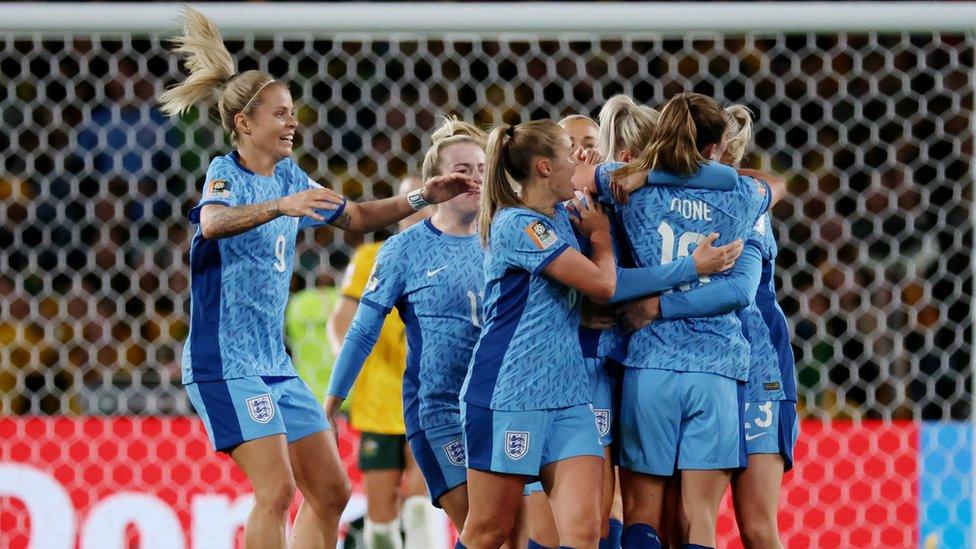 England's Ella Toone and teammates celebrates scoring their first goal in the semi-final against Australia