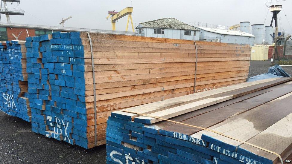 Unused timber sitting on a construction site.