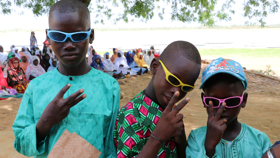 Boys in sunglasses at Eid prayers in Djiakaking, Segou, Mali - Saturday 9 July 2022