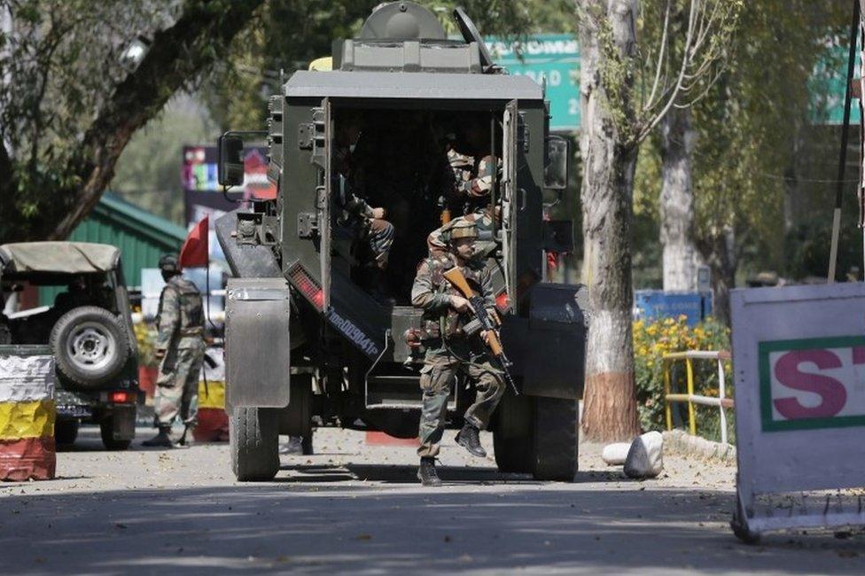 Indian army soldiers arrive at the army base which was attacked by suspected rebels in the town of Uri, west of Srinagar, Indian controlled Kashmir, Sunday, Sept. 18, 2016.