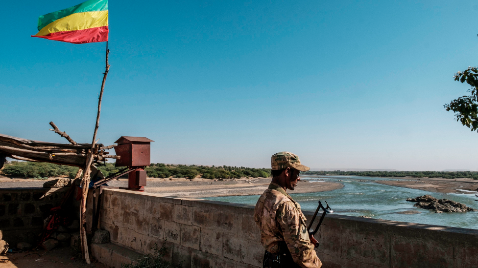 A member of the Amhara Special Forces in Humera watches on at the border crossing with Eritrea - 22 November 2020