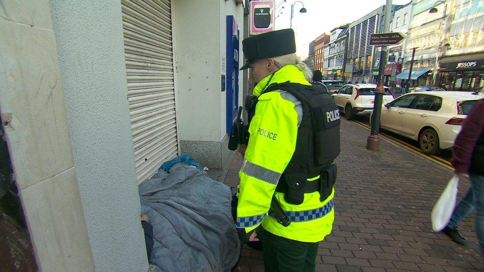 PSNi officer talks to person on street