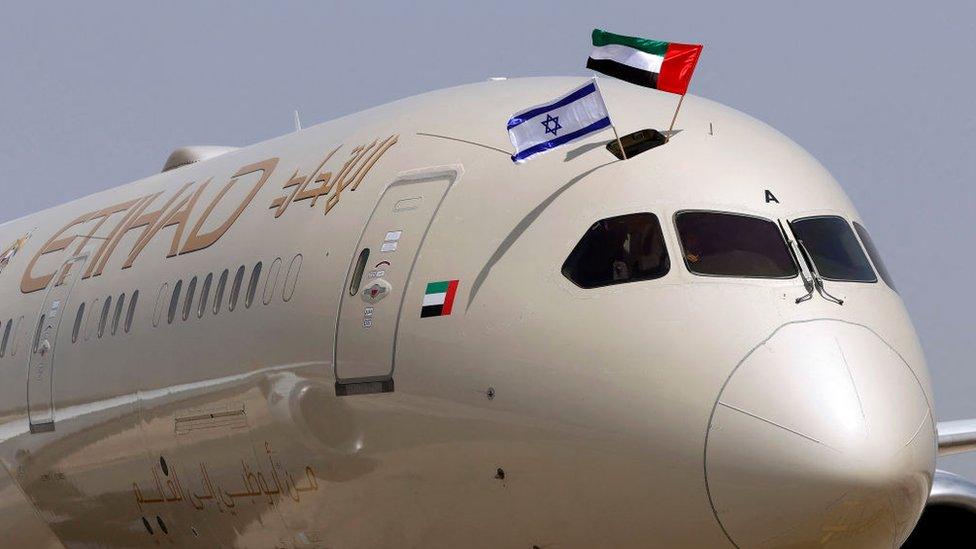 An Etihad Airways Boeing 787-9 "Dreamliner" aircraft displays Israeli and Emirati flags after landing upon arrival from the United Arab Emirates (UAE) at Israel's Ben Gurion Airport on 6 April