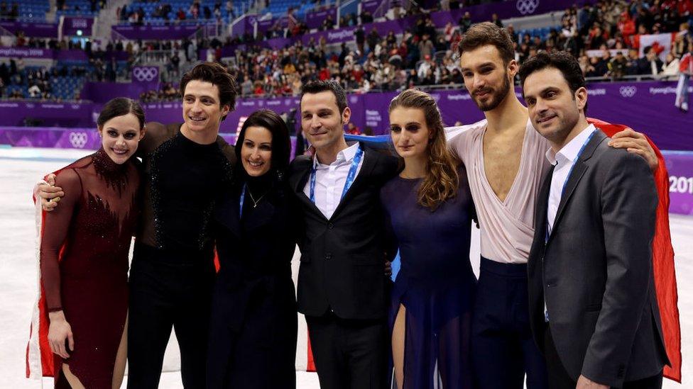 Skaters Tessa Virtue, Scott Moir, Gabriella Papadakis and Guillaume Cizeron with coaches Marie-France Dubreuil, Patrice Lauzon and Romain Haguenauer