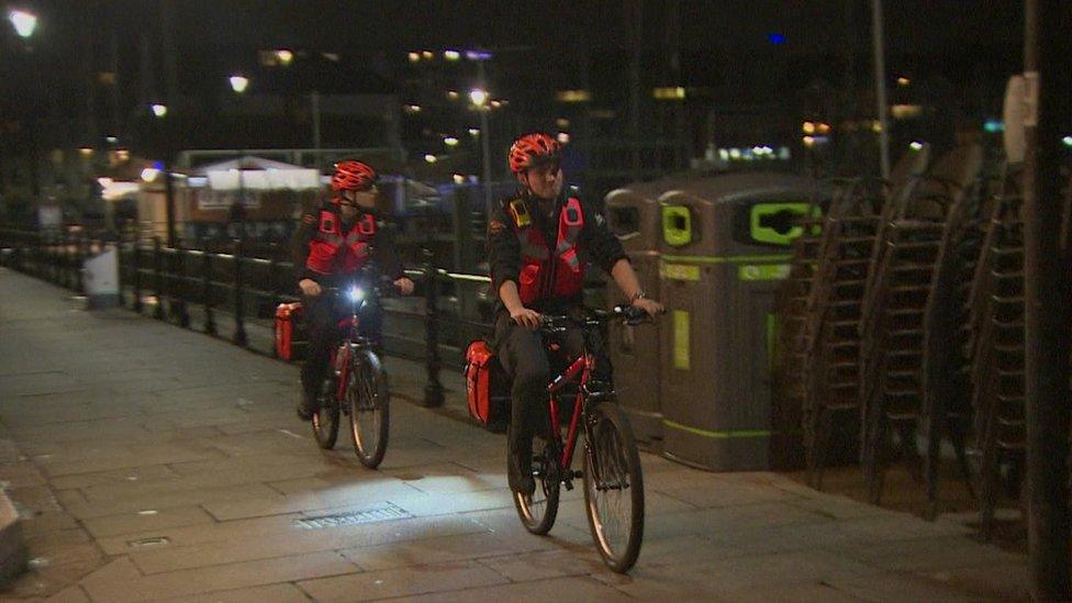 Volunteers on patrol bikes