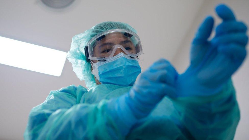 Doctor with PPE in hospital