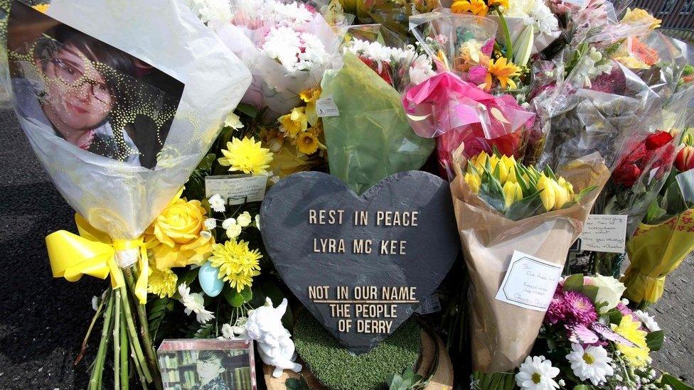 Floral tributes laid at the scene where Lyra McKee was shot in Londonderry