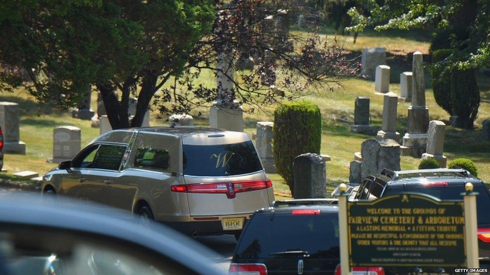 Hearse passes through the gates into Fairview cemetery, 3 Aug