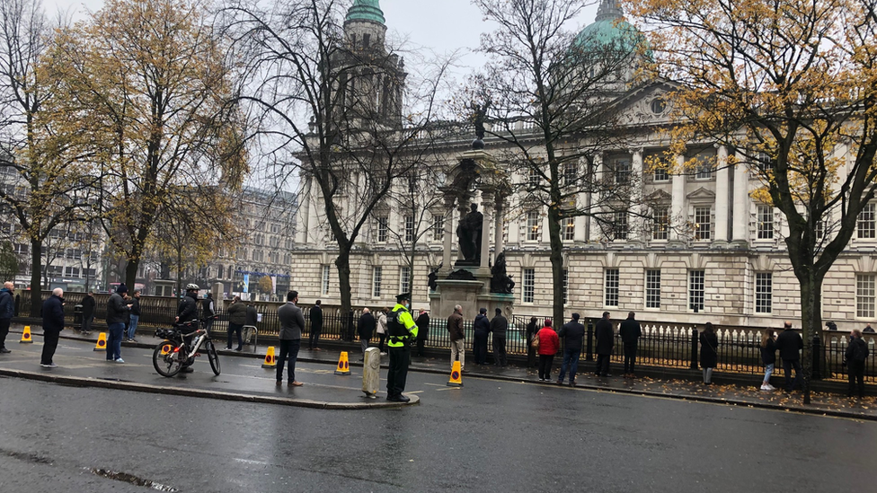 A small number of people gathered outside Belfast City Hall