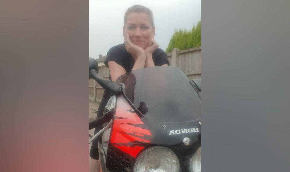 Felicity Rackstraw pictured smiling on her motorbike.