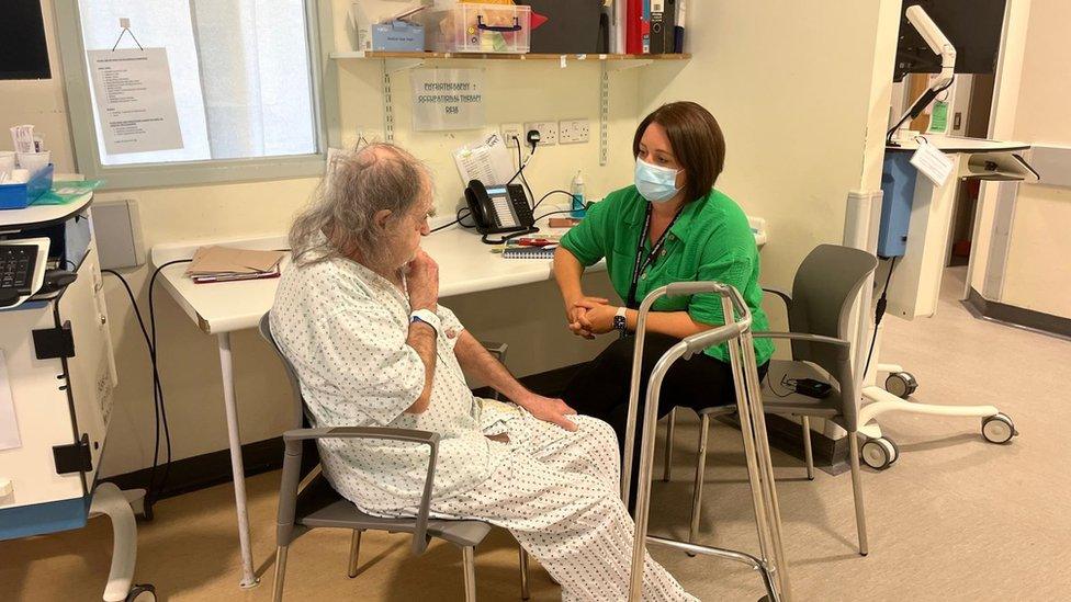 Patient speaking to social services in Norfolk and Norwich University Hospital