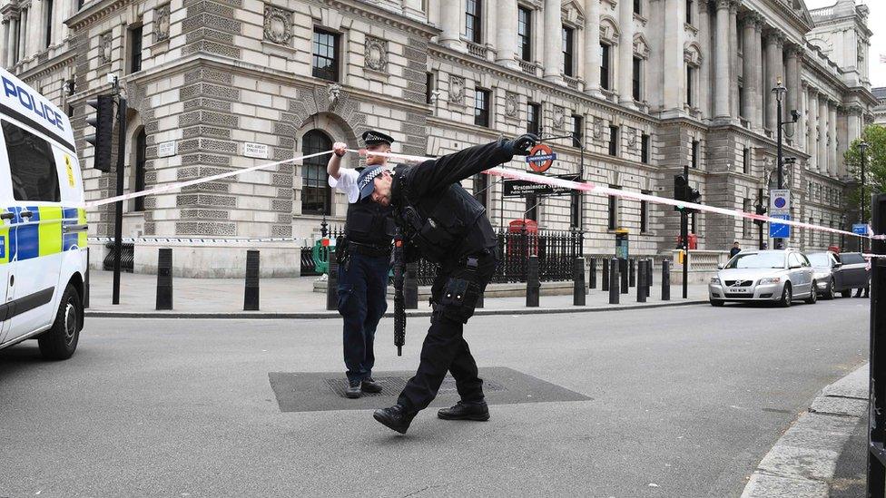 Police officers at the cordon