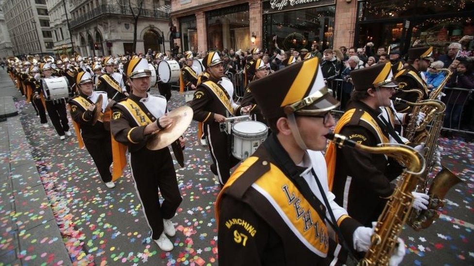 People take part in the London New Year's Day Parade.