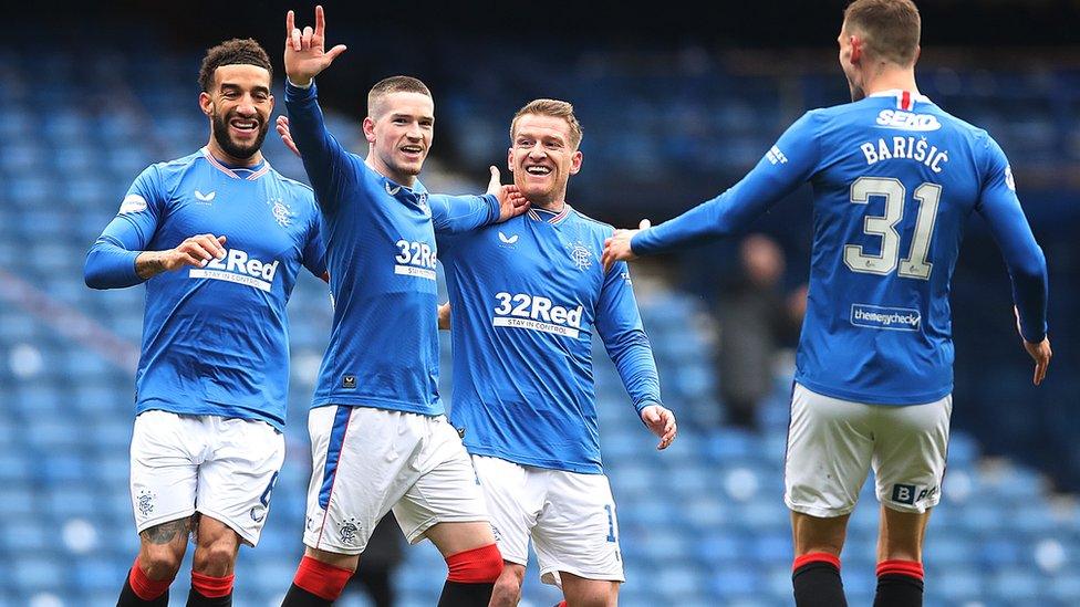 Rangers players celebrate goal