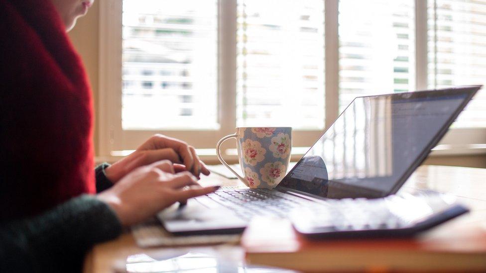 Woman working on a laptop computer