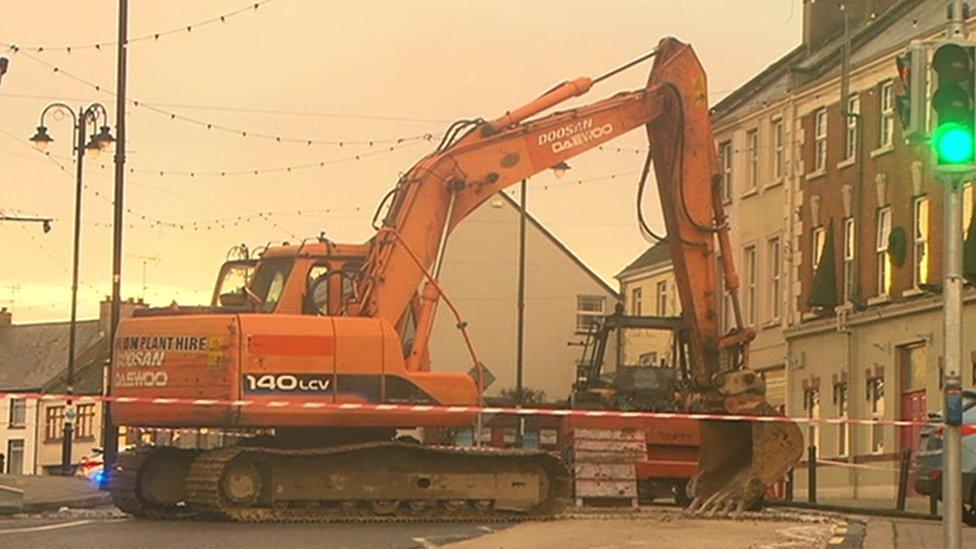 A digger at the scene of the robbery