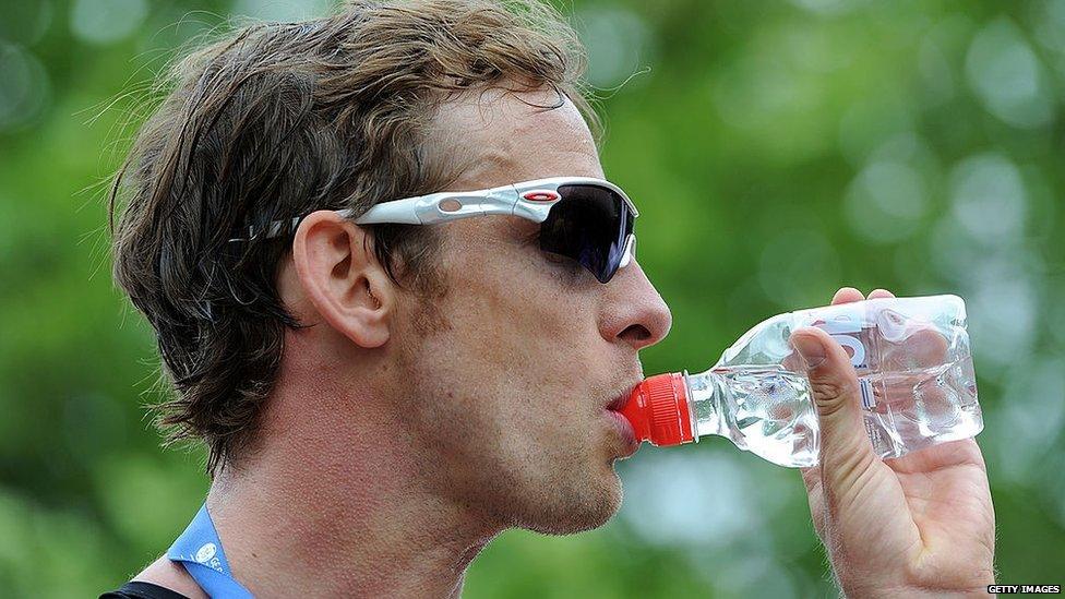 Jenson hydrating at an Ironman