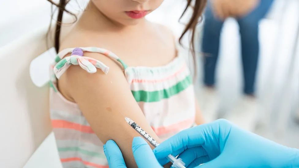 A child being vaccinated