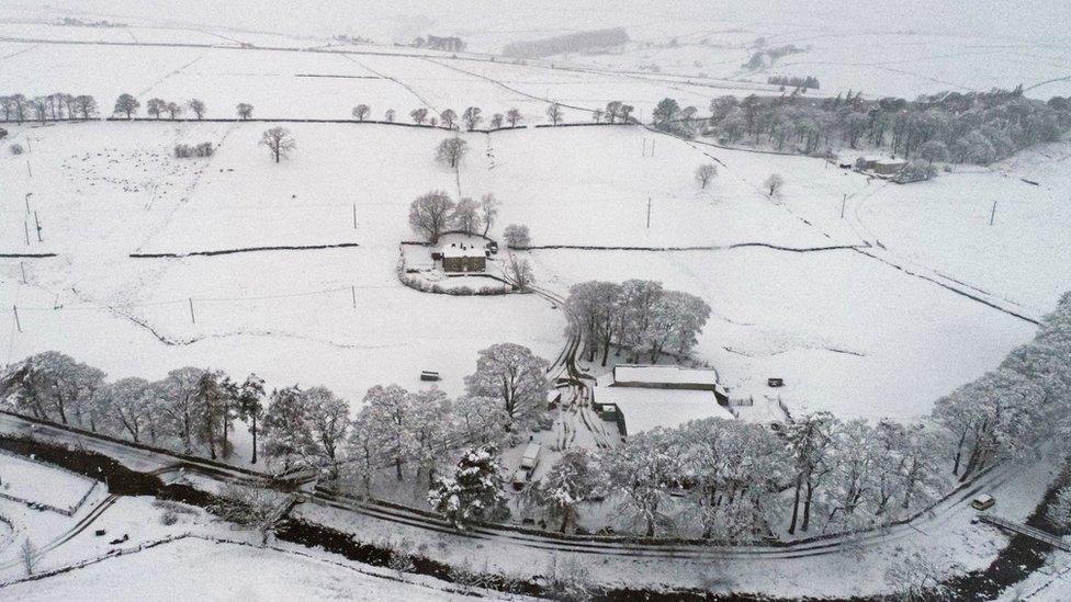 Snow-covered farmhouse in Allenheads