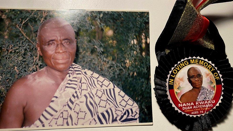 A photograph of a memorial image of cocoa farmer Nana Kwaku Duah