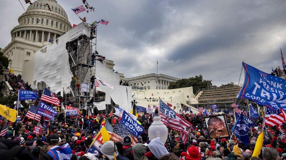 Trump supporters clash with police and security forces as people try to storm the US Capitol on January 6, 2021 in Washington, DC.