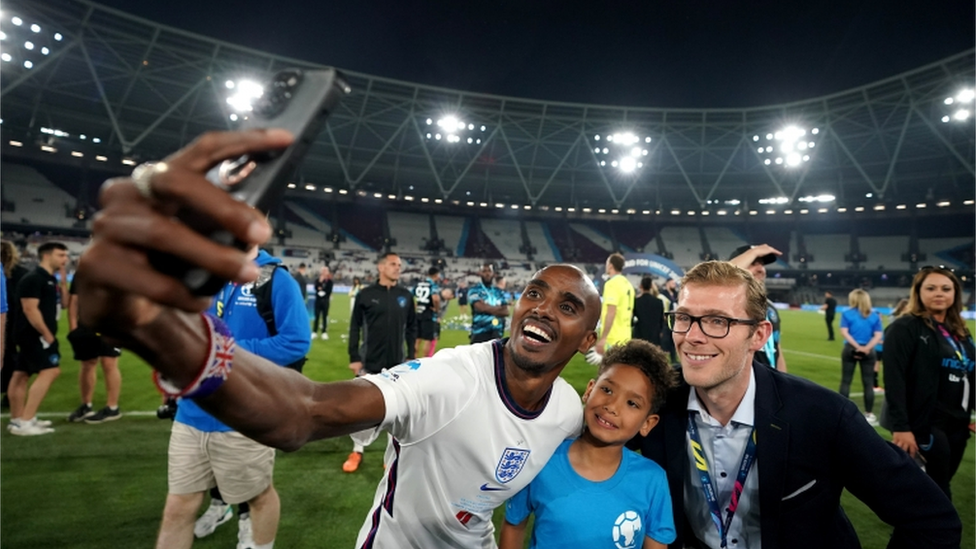 Mo Farah takes a selfie a Soccer Aid