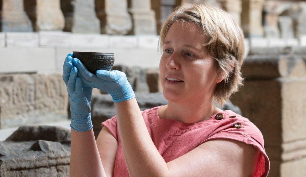 Curator Dr Frances McIntosh with the Rudge Cup one of Hadrian’s Wall’s earliest souvenirs