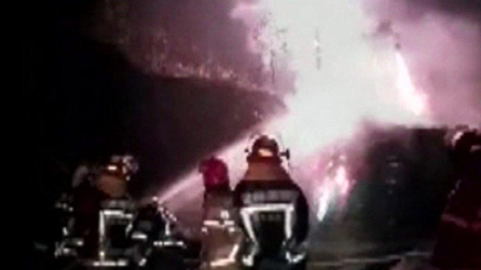 Fireworks explode for nearly five hours after the lorry carrying them overturns in China.