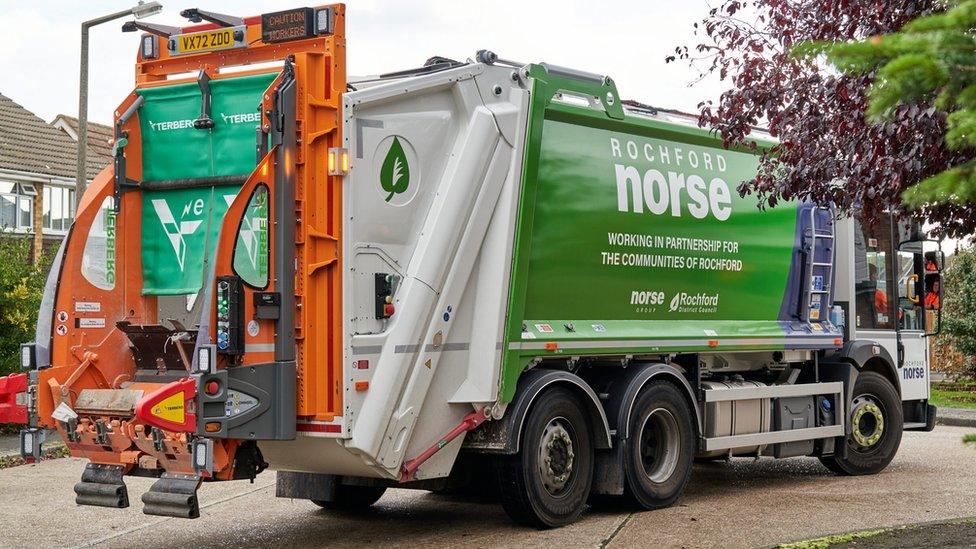 Green and orange Rochford District Council lorry