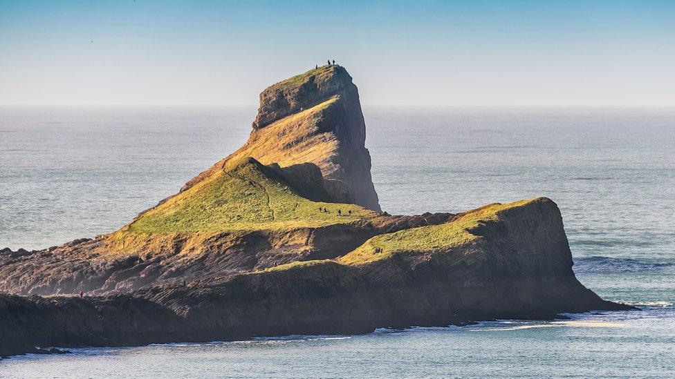 Hikers on top of Worm’s Head