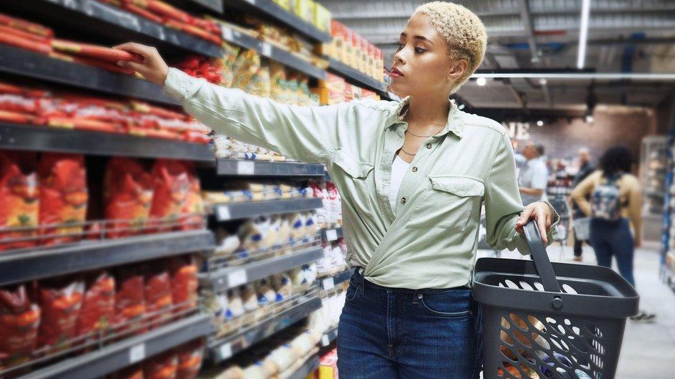 Woman shopping in supermarket