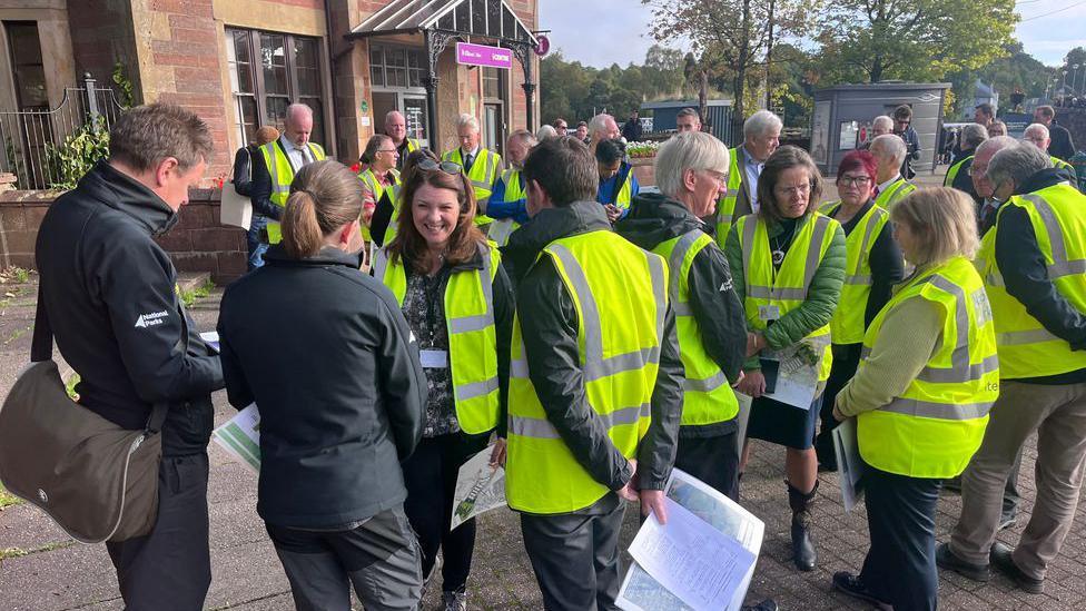 people gathered ahead of the site visit to lomond banks