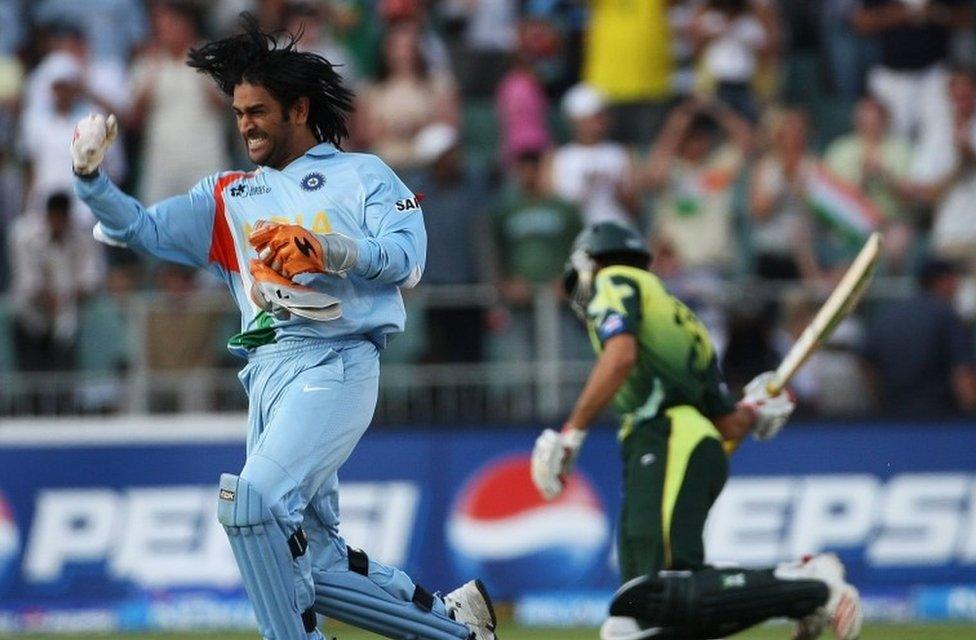 MS Dhoni of India celebrates his team"s victory with Misbah-ul-Haq of Pakistan looking on the World Twenty20 Final match between Pakistan and India at The Wanderers Stadium on September 24, 2007