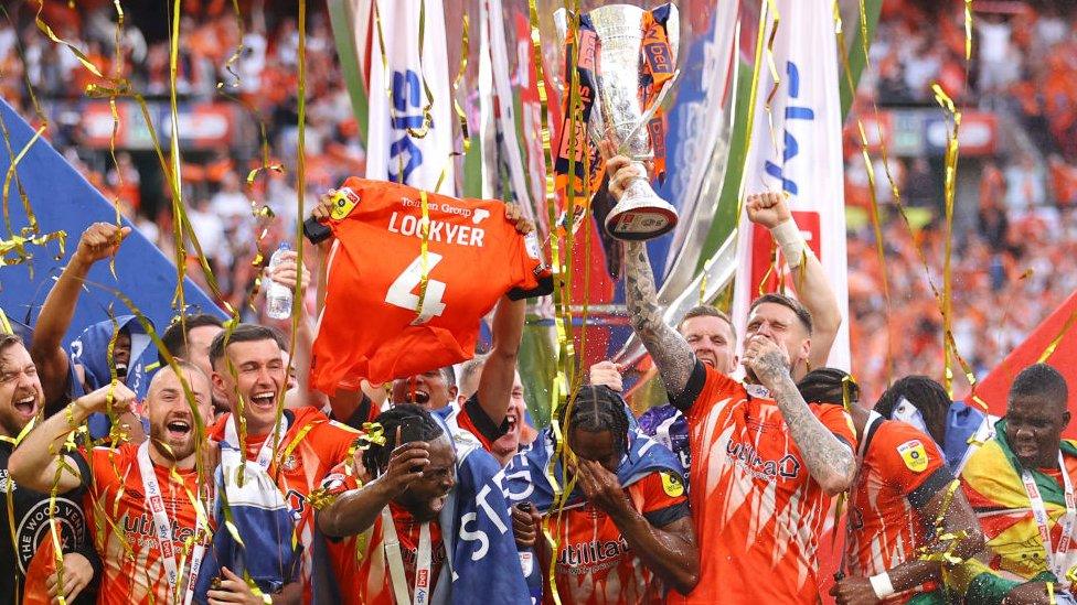 Luton Town players celebrate promotion