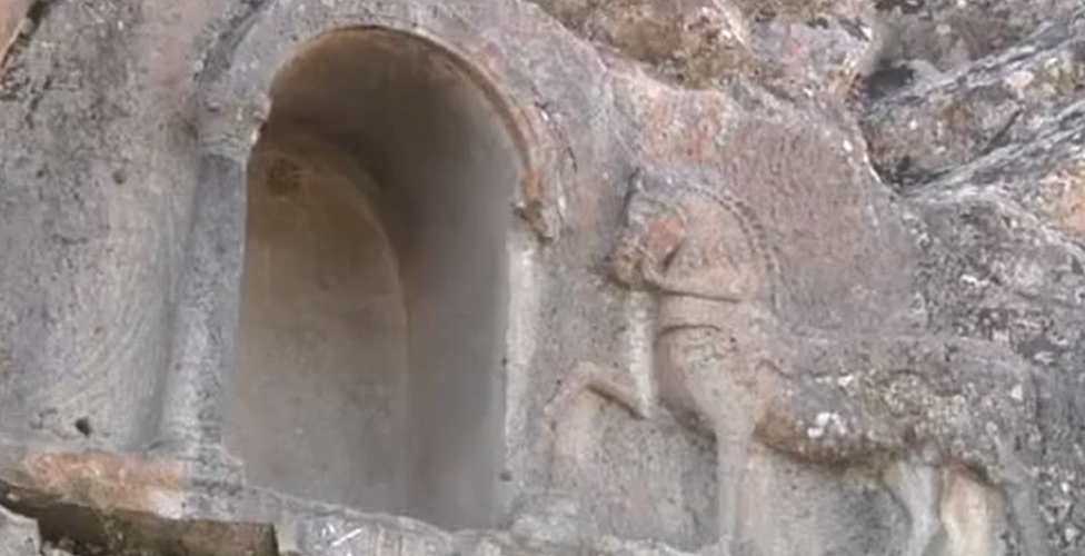 A screengrab showing the Lukuyanus Monument - a horse carved into rock