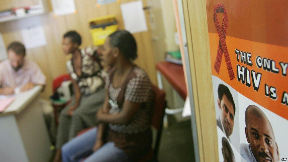 People sit in the waiting room in an anti-retroviral clinic in Emmaus hospital in Winterton, in South Africa's Kwazulu-Natal region on March 11, 2008.