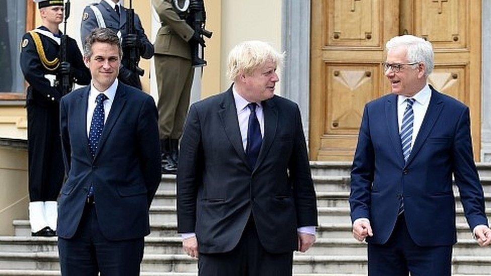 Gavin Williamson (left) and Boris Johnson (middle) on recent visit to Poland