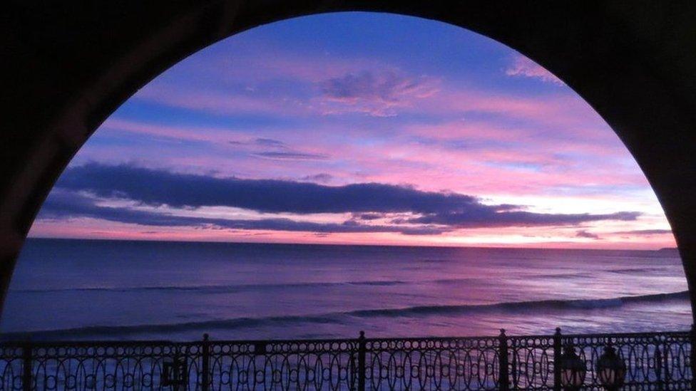 Vibrant purple colours during sunrise over the coast.