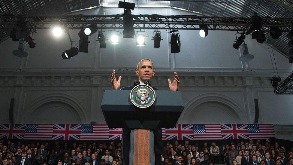 US President Barack Obama gestures as he gives a speech in central London