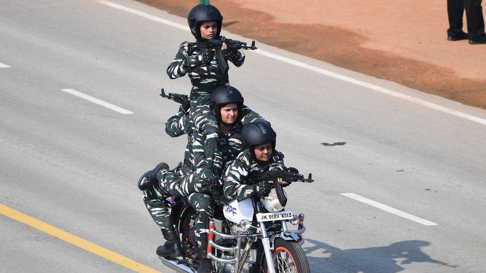 Central Reserve Police Force (CRPF) women motorcycle team members perform during the Republic Day parade in New Delhi on 26 January 2020.