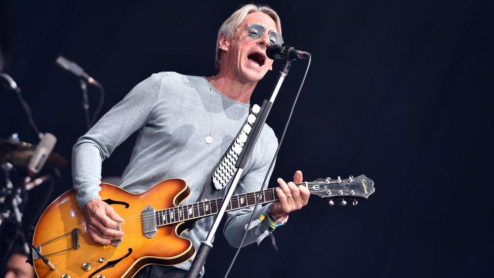 Paul Weller performing on the Pyramid Stage at Glastonbury Festival, 2015