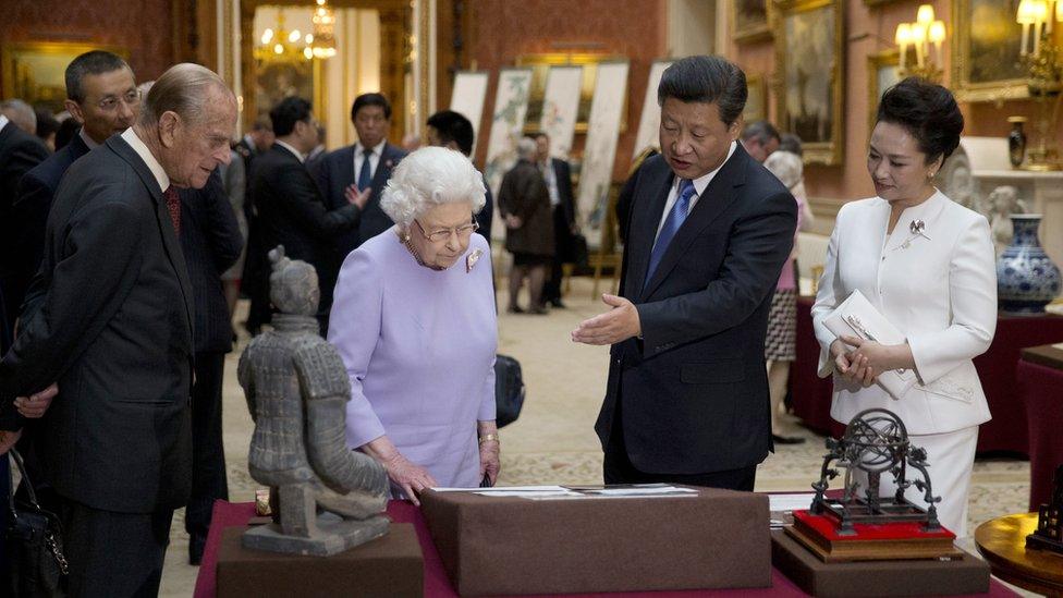 Chinese President Xi Jinping and his wife Peng Liyuan are showing around Buckingham Palace's Royal Collection by the Queen and Prince Philip