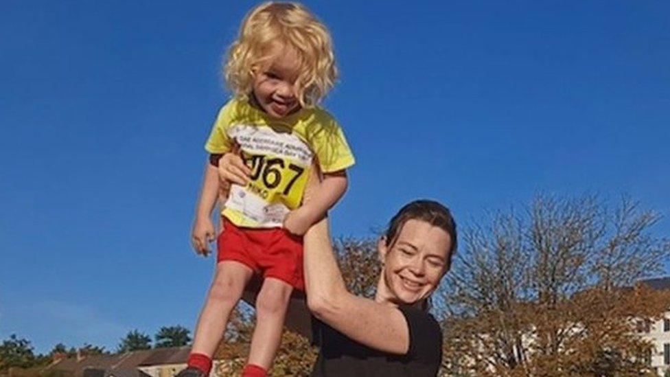 Niko and his mum after finishing the run