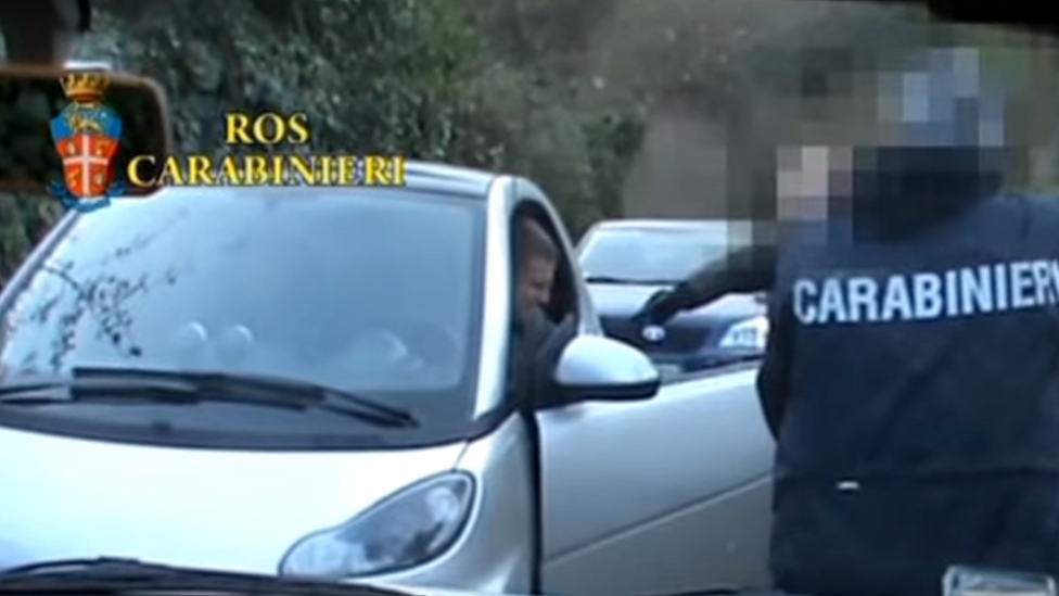 An image from an Italian police video of the arrest of Carminati in 2014