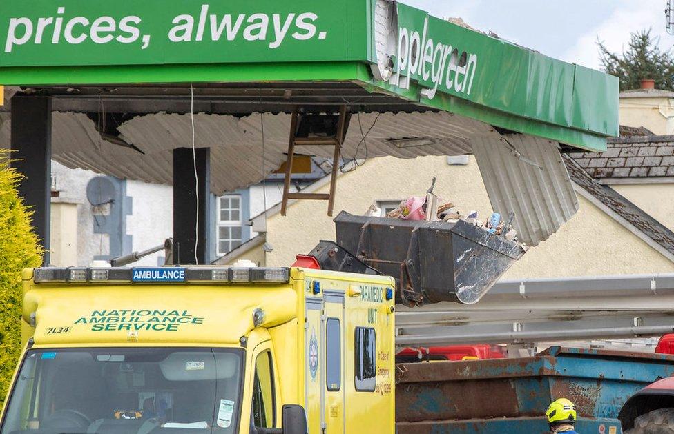 An ambulance at the scene of the service station explosion in Creeslough