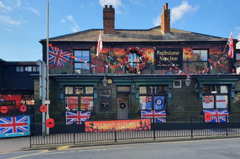 Snibstone New Inn pub covered in decorations