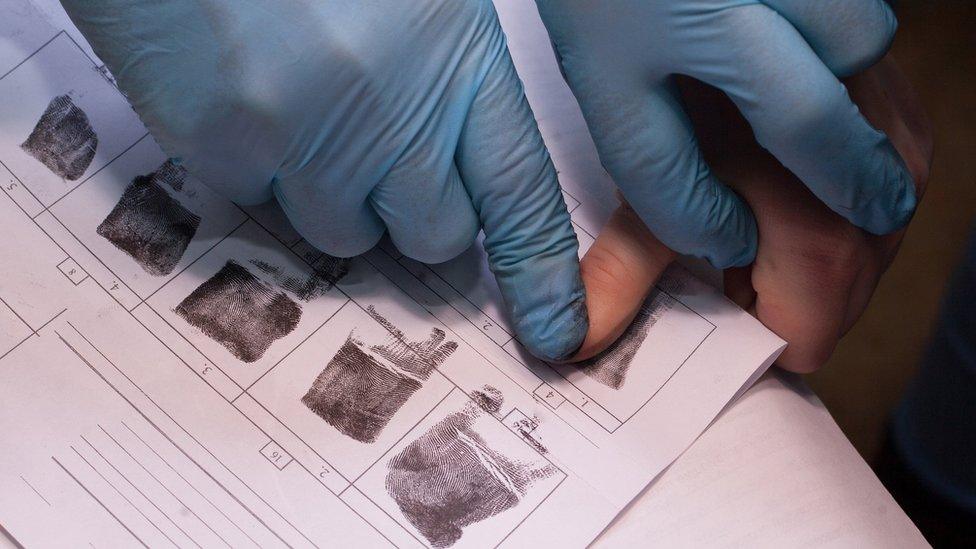 Fingerprints being taken (stock image)