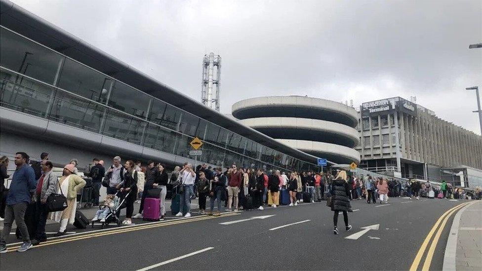 Queuing outside Dublin airport.