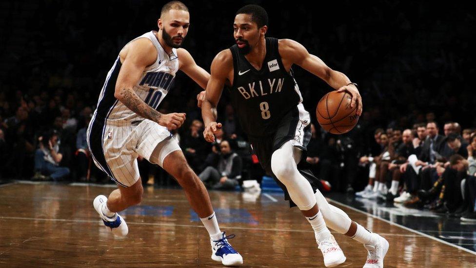 Spencer Dinwiddie #8 of the Brooklyn Nets drives against Evan Fournier #10 of the Orlando Magic during their game at the Barclays Center on January 23, 2019 in New York City