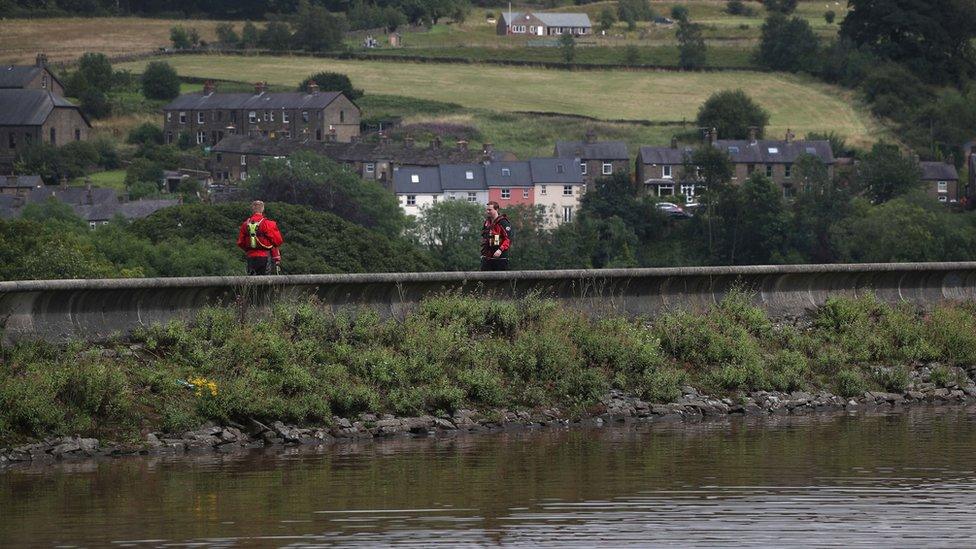 Emergency workers in Whaley Bridge